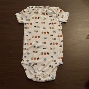 Carter’s 9 month onesie